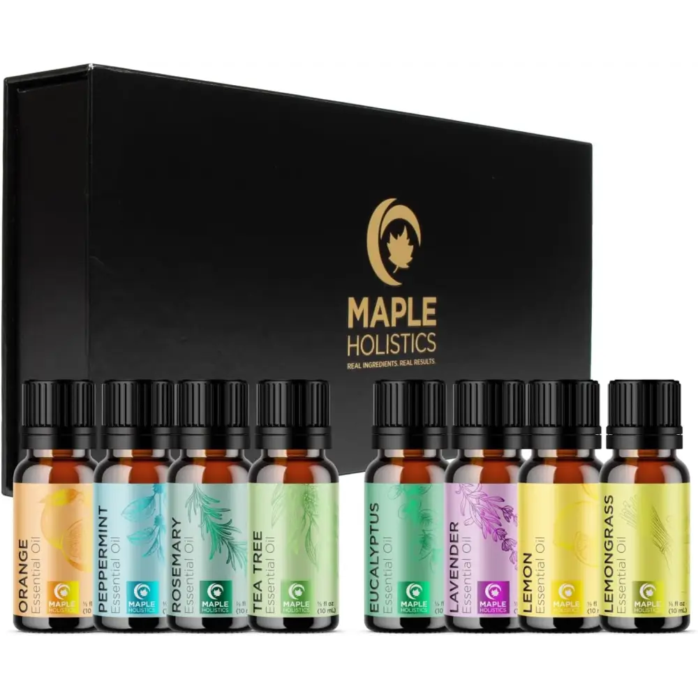 Set of essential oil bottles in a box featuring Maple Holistics logo and plant extracts