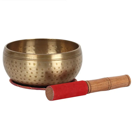 15cm beaten brass singing bowl with wooden striker and red cushion for meditation