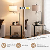 Modern floor lamp with curved neck and white drum shade featuring USB charging ports