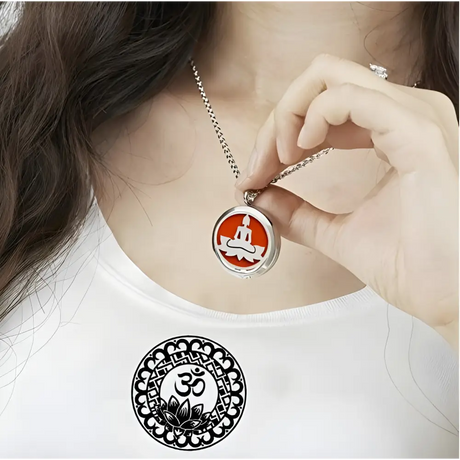 Round silver Buddha pendant necklace with orange design, perfect essential oil diffuser