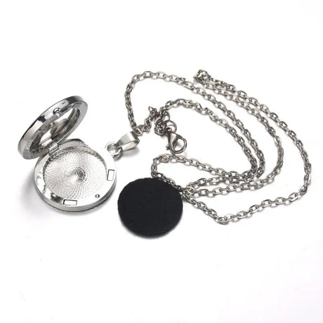 Silver pocket watch necklace diffuser pendant with chain featuring a black pendant