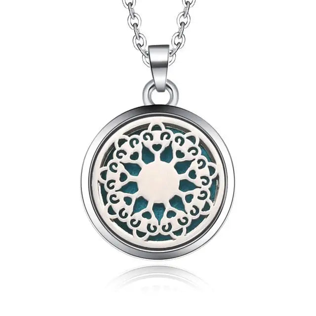 Decorative silver necklace diffuser pendant with mandala pattern and turquoise accents