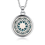 Decorative silver necklace diffuser pendant with mandala pattern and turquoise accents