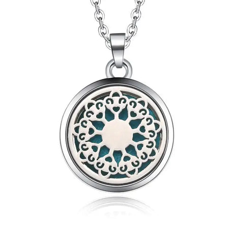 Decorative silver necklace diffuser pendant with mandala pattern and turquoise accents