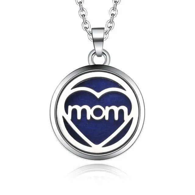 Silver necklace diffuser pendant with mom heart on dark blue background