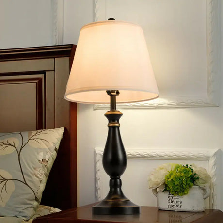 Traditional black turned base lamp with white shade in a brushed nickel lamp set