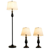 Set of three matching brushed nickel lamps with cream shades for stylish lighting