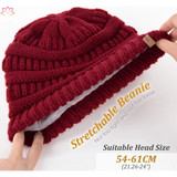 Deep red knitted beanie with ribbed texture, perfect for a slouchy winter hat look