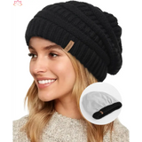 Black slouchy winter hat knit beanie featuring a small leather tag detail