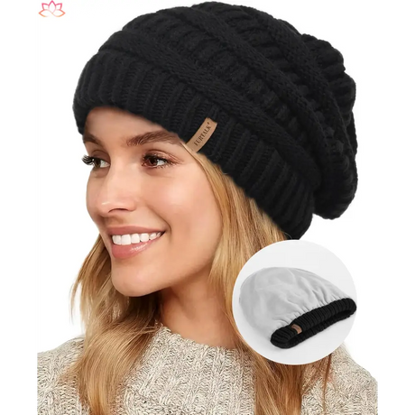 Black slouchy winter hat knit beanie featuring a small leather tag detail