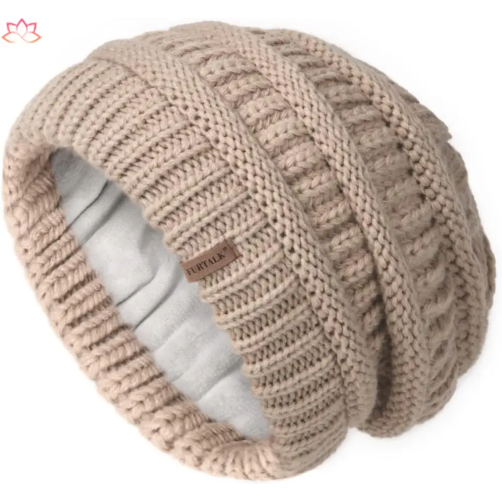 Beige knitted slouchy winter hat with ribbed pattern and fleece lining for warmth