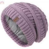 Slouchy winter hat knit beanie in dusty purple with fleece lining and ribbed pattern