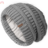 Gray knitted slouchy winter hat with textured pattern and brand tag, featuring fleece lining