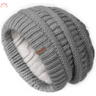 Gray knitted slouchy winter hat with textured pattern and brand tag, featuring fleece lining