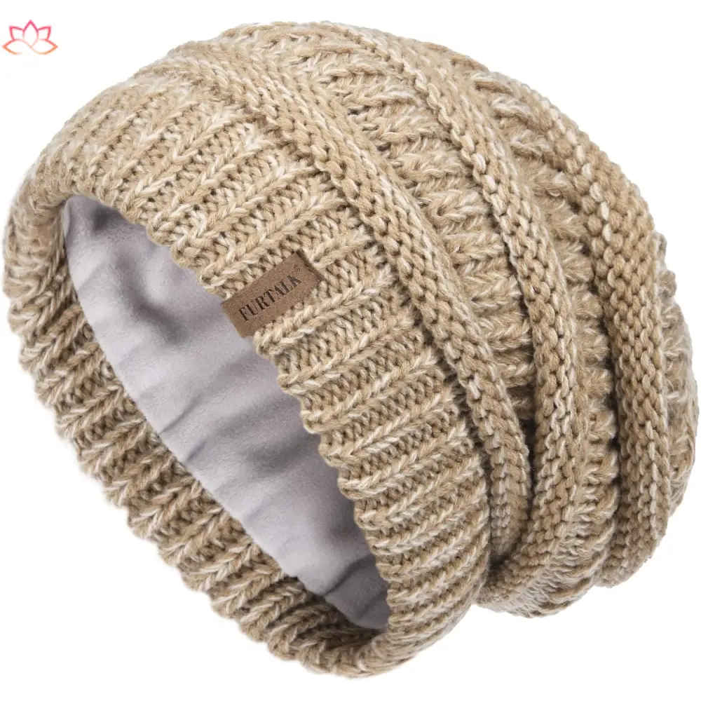 Beige knit beanie with ribbed texture and fleece lining, perfect slouchy winter hat