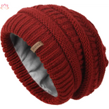 Red knit beanie with fleece lining, perfect slouchy winter hat for stylish warmth