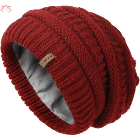 Red knit beanie with fleece lining, perfect slouchy winter hat for stylish warmth