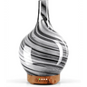 Glass diffuser with black and white swirls on wooden base for ultrasonic essential oil use