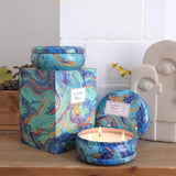 Decorative turquoise and blue marbled candle tins with pure soy wax multi-wick candles