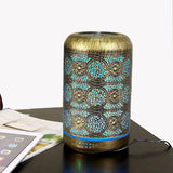 Decorative metal oil diffuser with turquoise patterns and golden top for essential oils