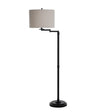 Black metal adjustable swing arm floor lamp with beige drum shade and brushed nickel base