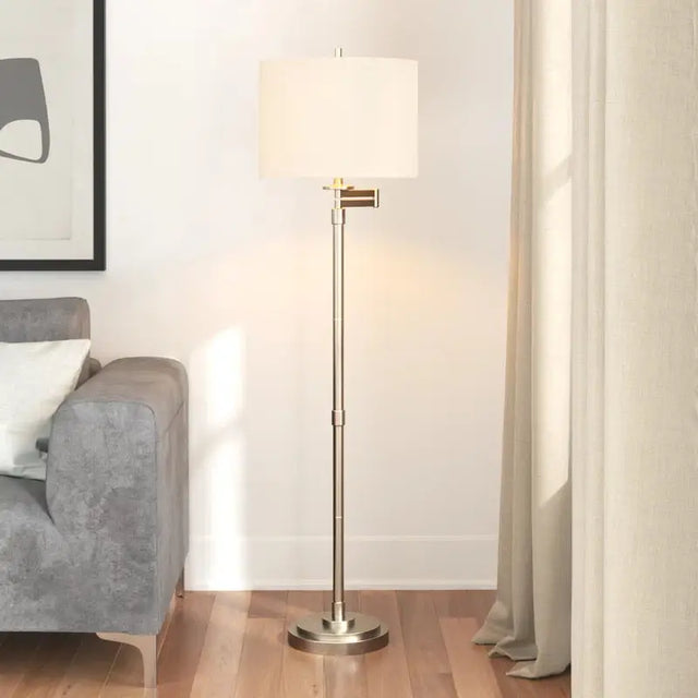 Brushed Nickel Adjustable Swing Arm Floor Lamp with White Drum Shade for versatile lighting