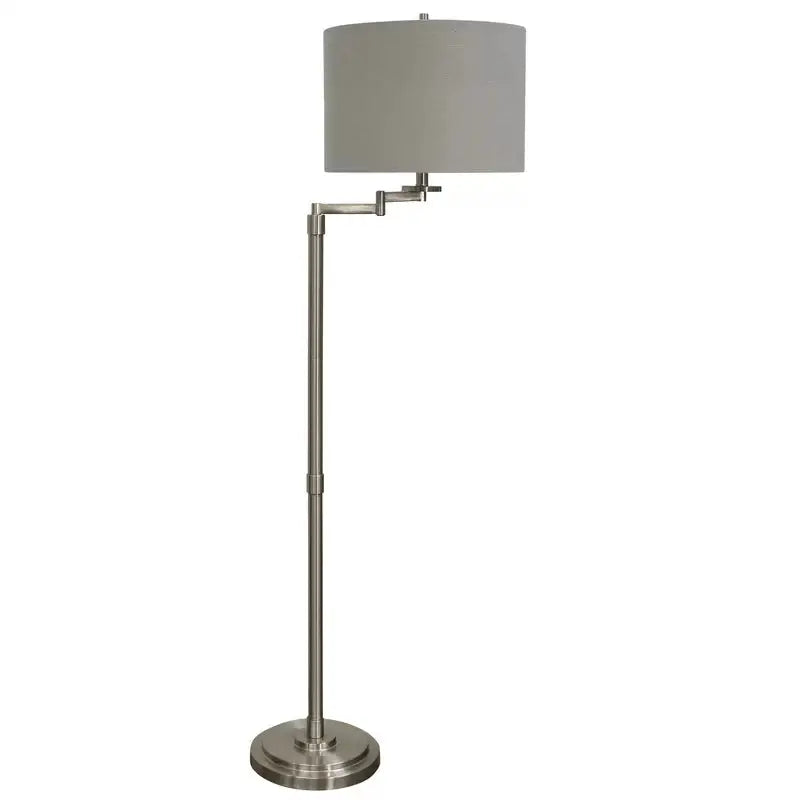 Brushed Nickel Adjustable Swing Arm Floor Lamp with Gray Drum Shade in a modern setting