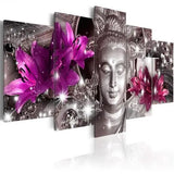 Multi-panel canvas wall art featuring a Buddha statue with vibrant magenta lilies