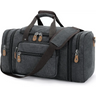 Canvas duffel bag with 50L capacity featuring zippered compartments and adjustable strap