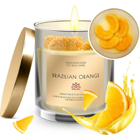 Lit Brazilian Orange scented soy candle in glass jar with gold lid for diffusers & candles