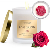 White scented soy candle with gold lid and Rose Garden label in green glass jar