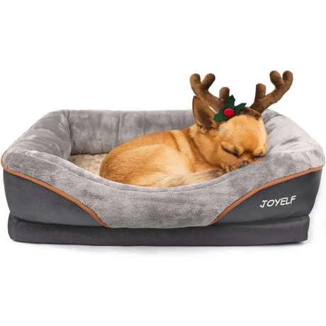 Chihuahua in reindeer antlers sleeping on Cozy Christmas orthopedic dog bed with memory foam