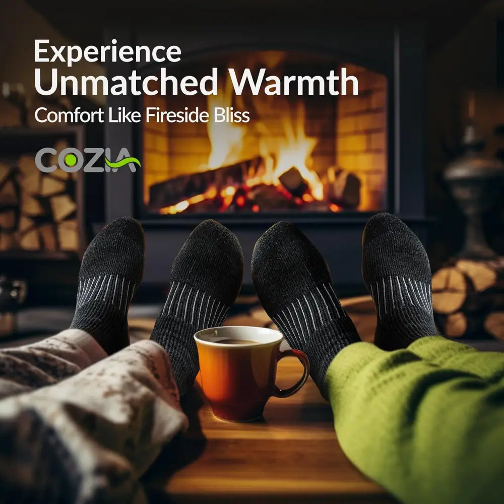 Two pairs of feet in Cozy Merino Wool Flame Design Thermal Socks by a fireplace