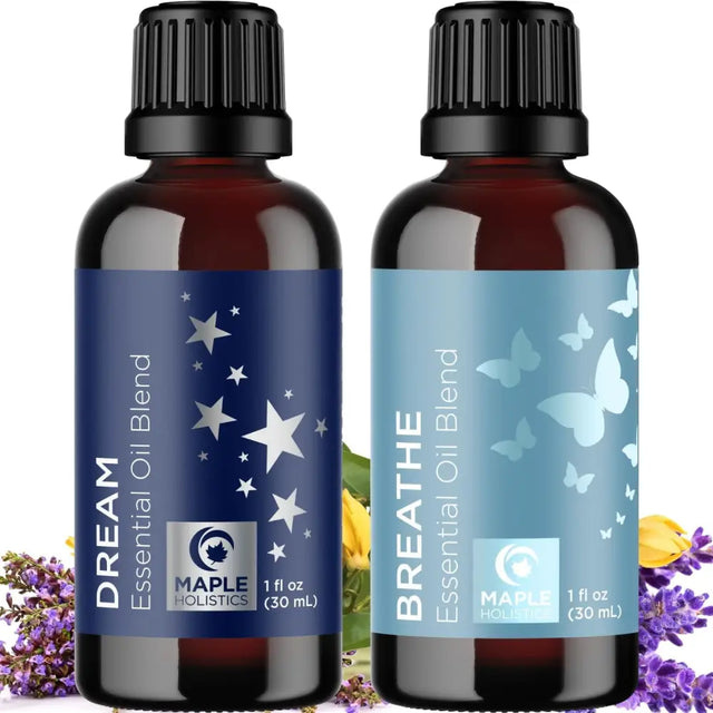 Two amber glass essential oil bottles of Dream and Breathe blend set