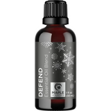 Dark amber essential oil bottle with snowflake design and Defend Essential Oil Blend label