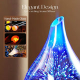 Glowing blue glass aroma diffuser with starburst pattern for elegant 3D glass decor