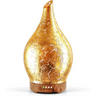 Gold crackled glass aromatherapy oil diffuser with wooden base and LED lights