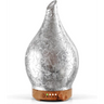 Silver metallic teardrop oil diffuser with wooden base and LED lights for glass aromatherapy