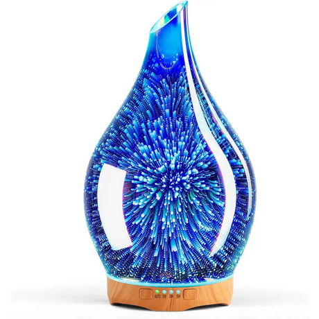 Elegant 3D Glass Marble Oil Diffuser with blue starburst LED light pattern for glass aromatherapy