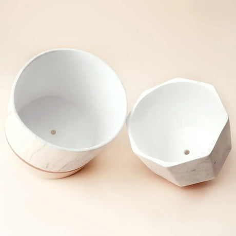 Elegant White Ceramic Planters with Rose Gold Accents featuring drainage holes