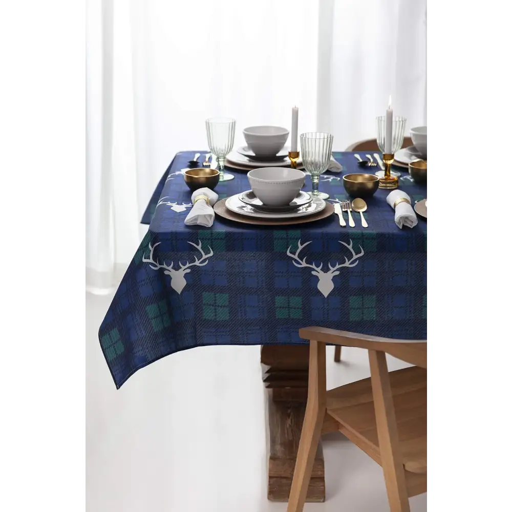 Navy blue Christmas tablecloth with deer head and plaid pattern for festive dining