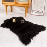 Fluffy Faux Sheepskin Fur Area Rug showcasing luxurious black texture and long pile