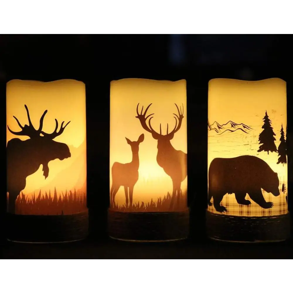 Three flameless flickering candles with woodland animal silhouettes and hemp rope accents