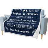 Navy blue and white throw blanket with inspirational quotes for best friends on a chair