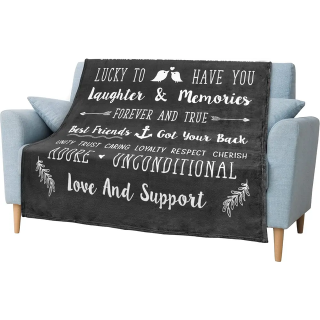 Soft throw blanket with friendship quotes for best friends on a dark background