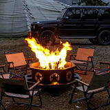 Metal fire pit with star cutouts, ideal for wood burning and camping trips as a focal point