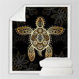 Ornate golden sea turtle design on a fluffy fleece blanket, perfect for cozy warmth