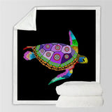 Colorful sea turtle blanket design in fluffy fleece featuring geometric patterns