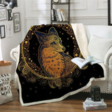 Fluffy fleece blanket with mystical fox design and golden celestial patterns on black background