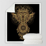 Intricate golden owl design on a soft fleece blanket featuring ornate patterns